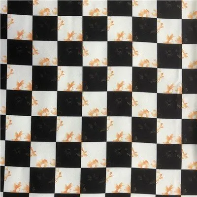 Teixit groc de flors a quadres