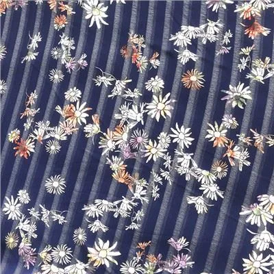 Tela de gasa amb ratlles degradades de crisantem blau marí